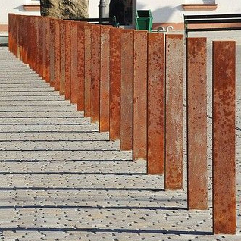 corten posts used as fence bollards