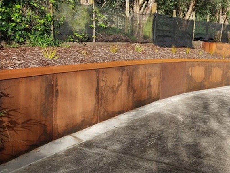 Corten retaining wall with cappin 30@ tall